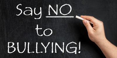 A chalk board with 'say no to bullying' written